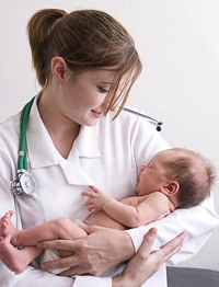 doctor with newborn